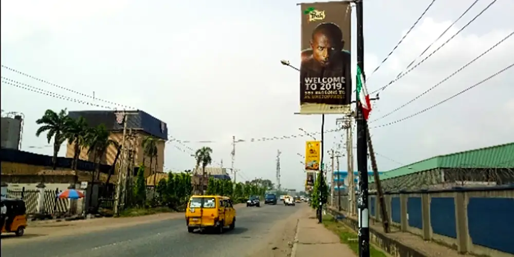 Lamp Poles billboard - Along Acme Road