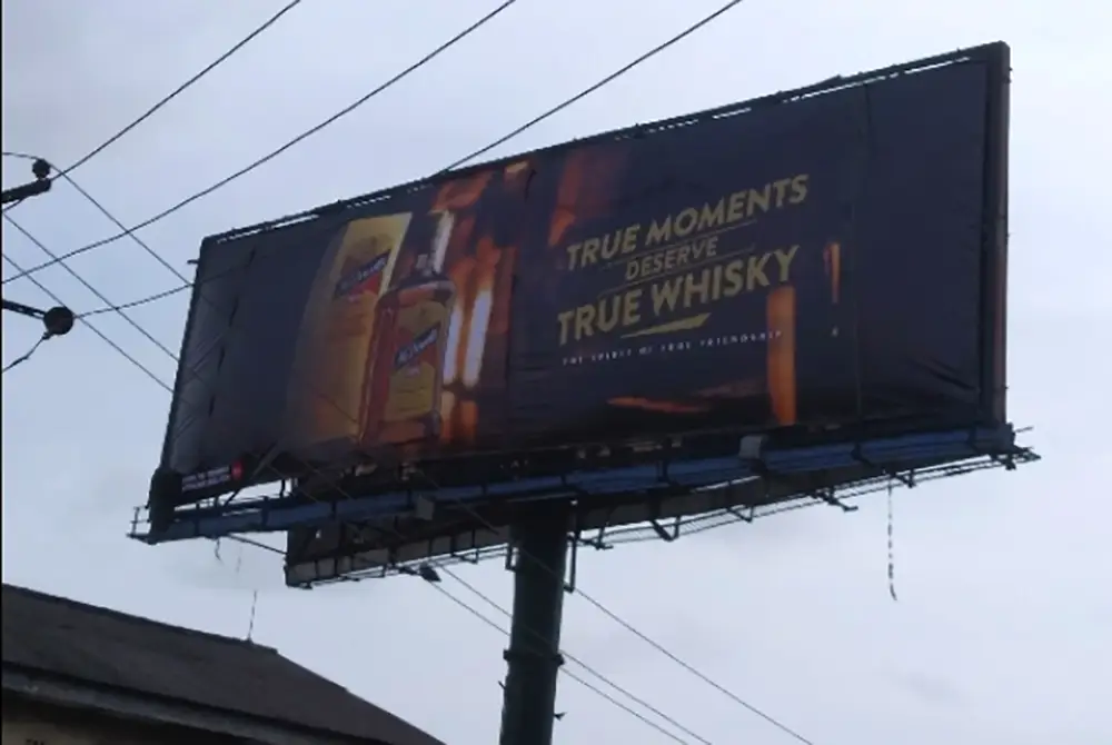 Unipole billboard - Along Mobil Road
