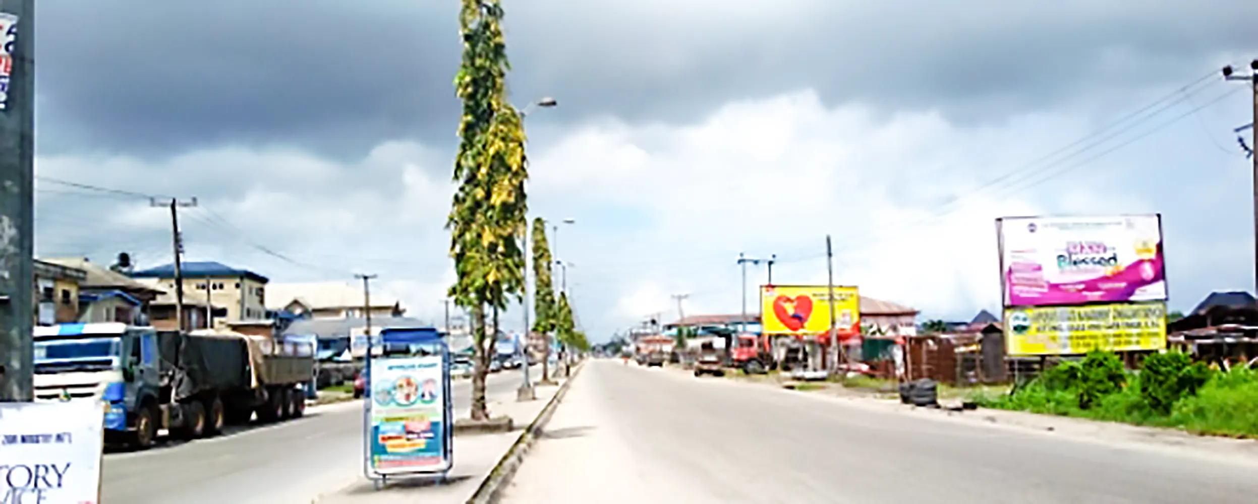48 Sheet billboard - Airport Road By Total Filling Station Facing